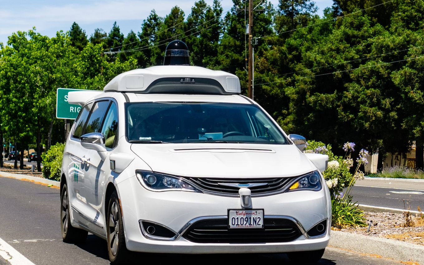 Google's self-driving Waymo car with a LiDAR unit on its roof